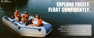 Inflatable dinghy with orange life jackets and white exterior.