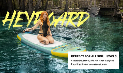 Inflatable paddleboard with a kneeling woman.