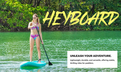 Paddleboard with a woman paddling.