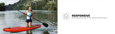 Woman paddling on red board.