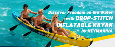 Yellow and blue inflatable kayak by heymarina with drop-stitch design.